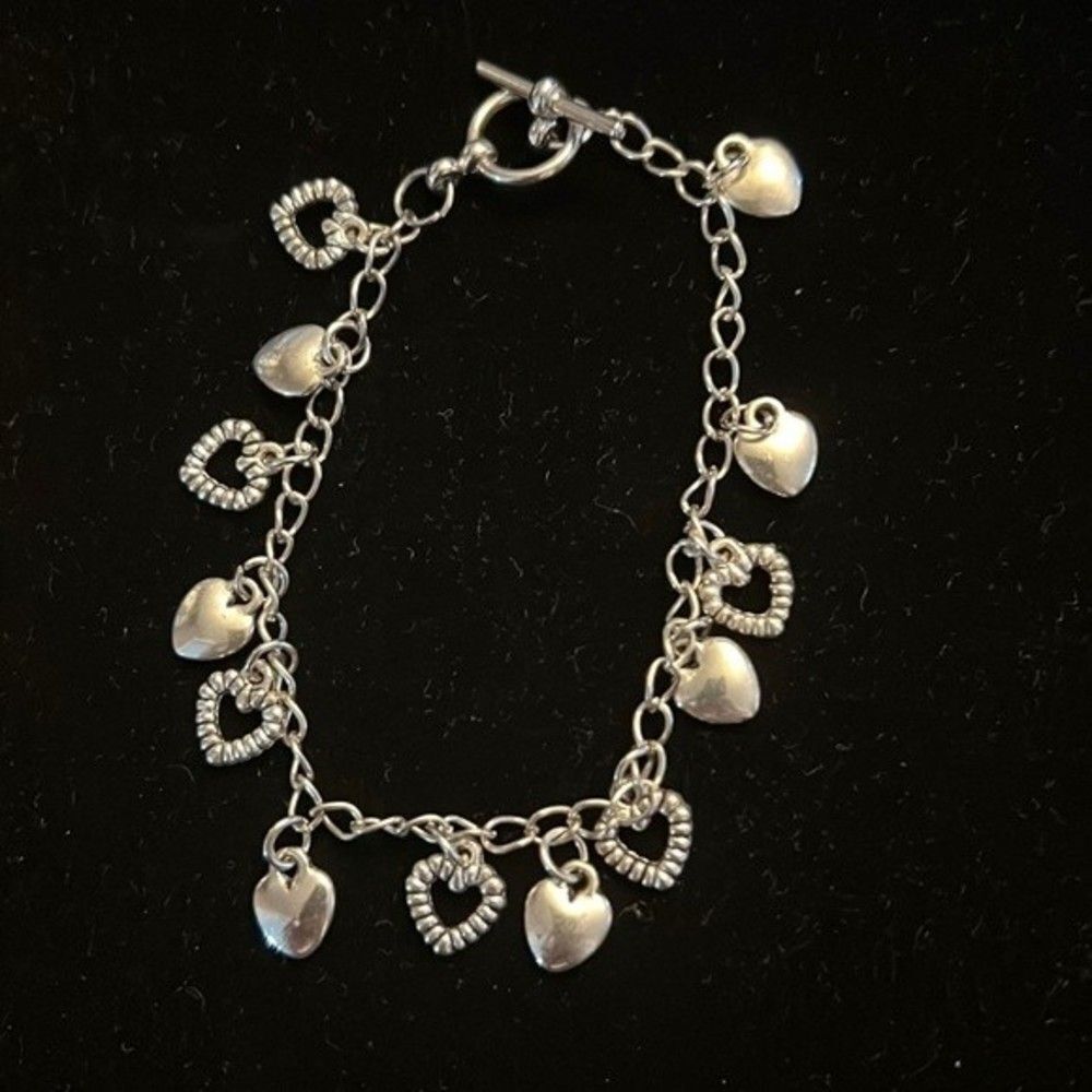 Handcrafted silver tone heart charm bracelet